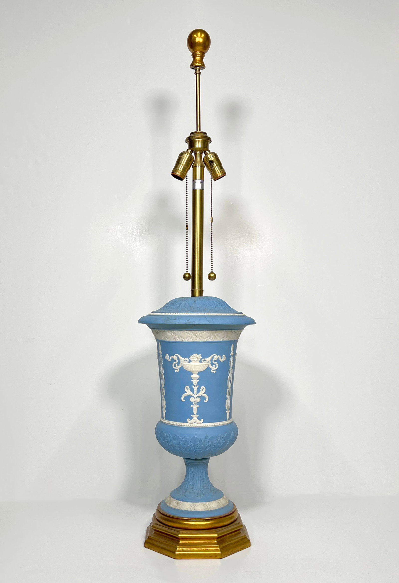Wedgwood Style Jasperware Lamp: Wedgwood style light blue jasperware lamp on a hexagonal gilt plinth base. Height: 37.5"