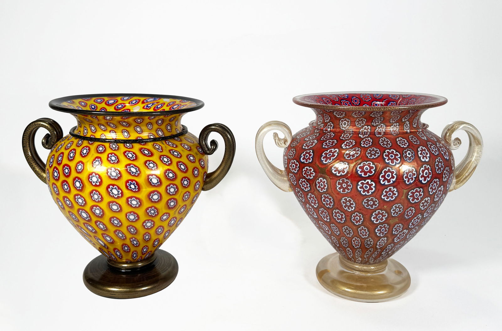 Gambaro & Poggi Murano Glass Vases: Gambaro & Poggi Murano glass millefiori vases, each with two handles. 9.75 x 9.5 inches 218 ounces