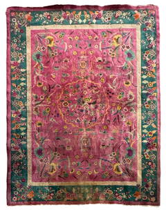 Chinese Art Deco Rug: Chinese Art Deco rug featuring a pink field with floral motifs and a green floral border. Dimensions: 137 x 105 inches.