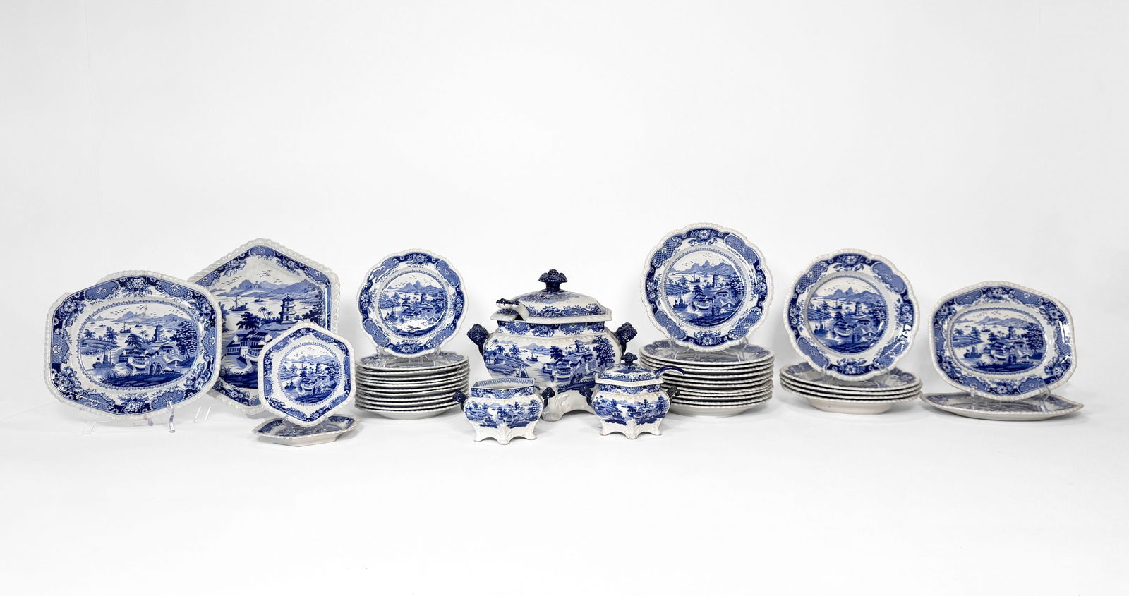 John & William Ridgway Stone China Service: John & William Ridgway Stone China, "Indian Temple" pattern, circa 1814-1830, each piece with gadrooned rim, printed title and factory marks; including: 3 rectangular serving dishes, 1 hexagonal servi