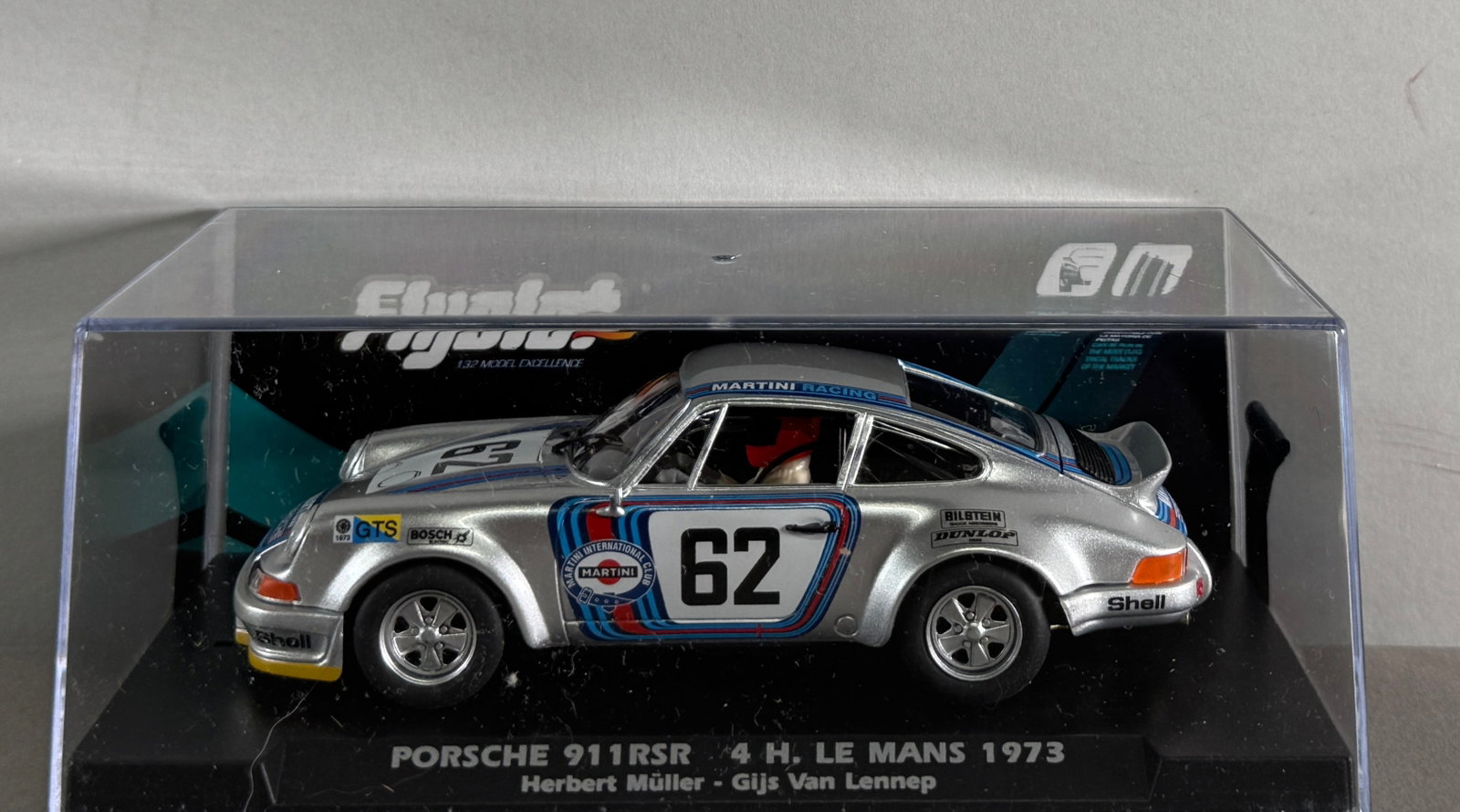 Flyslot Porsche 911 RSR 4h. Le Mans 1973 Muller-Van Lennep #62 Martini 1/32 Slot Car: Flyslot Porsche 911 RSR 4h. Le Mans 1973 Muller-Van Lennep #62 Martini 1/32 Slot Car. Reference #036105, with original case. 