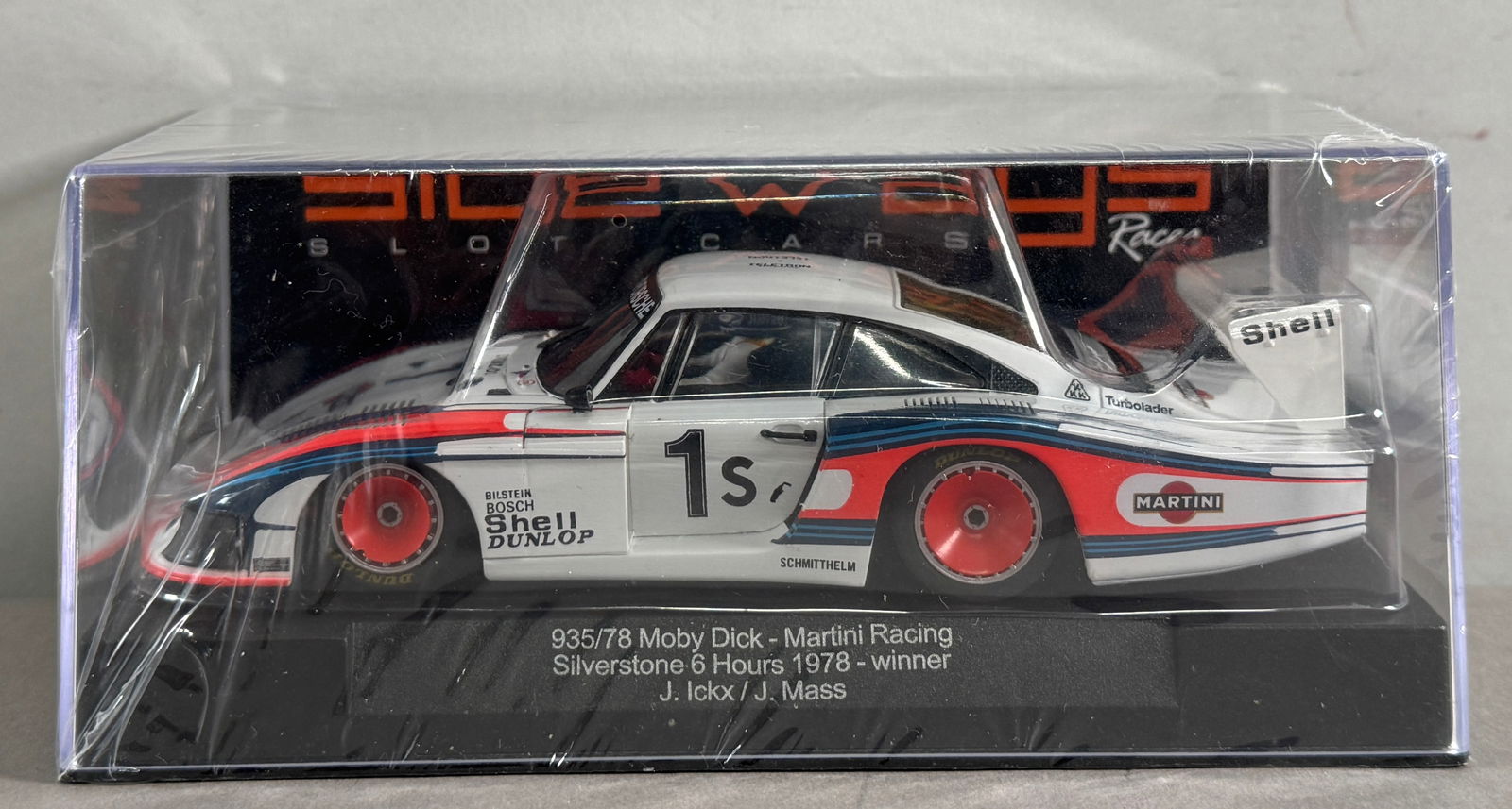 Sideways 935/78 Moby Dick Martini Racing Silverstone 6h. 1978 winner J. Ickx/J.Mass #1s Shell 1/32: Sideways 935/78 Moby Dick Martini Racing Silverstone 6h. 1978 winner J. Ickx/J.Mass #1s Shell 1/32 Slot Car. Reference #SW20, with original case. 