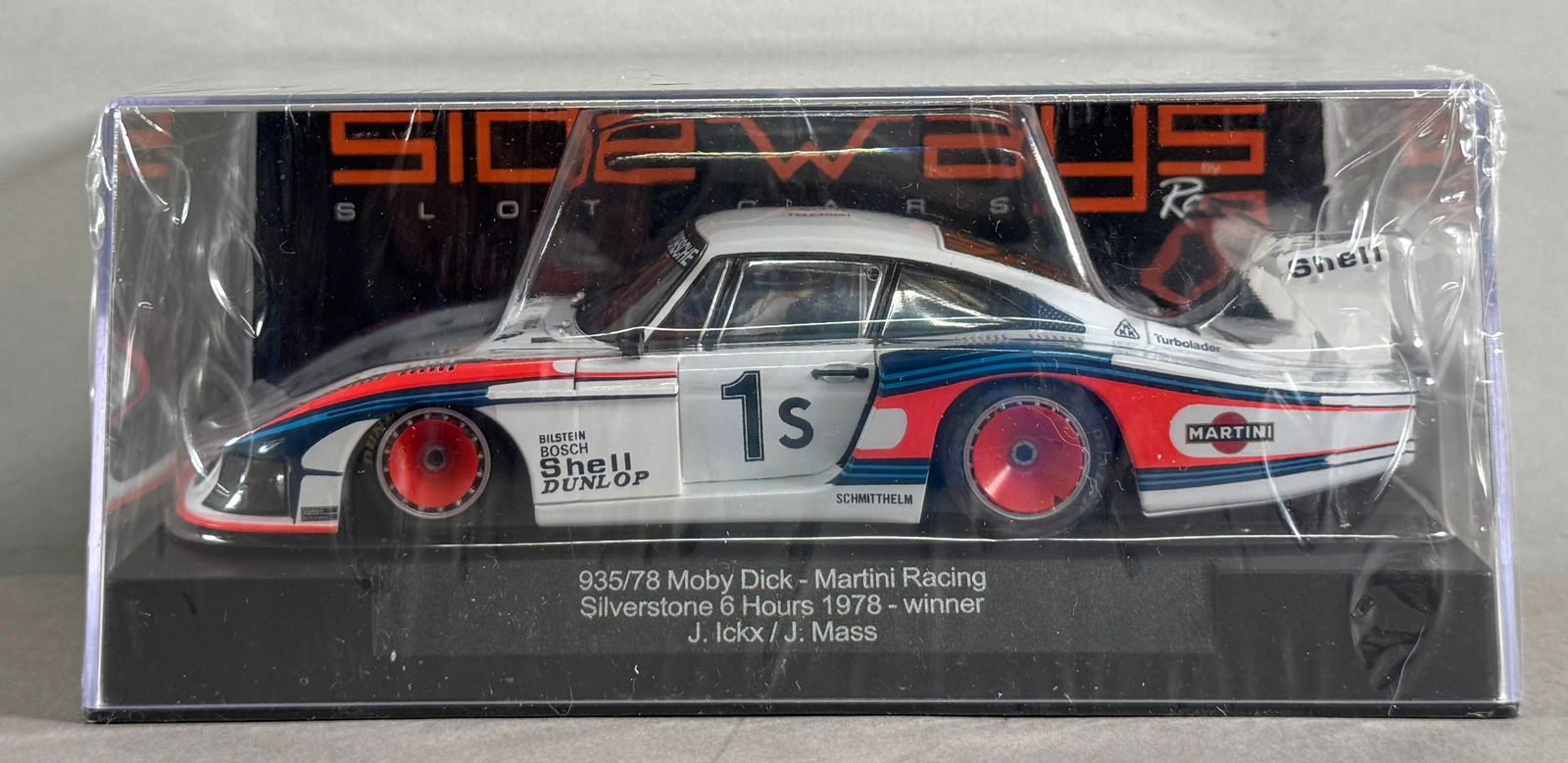 Sideways 935/78 Moby Dick Martini Racing Silverstone 6h 1978 winner J. Ickx/J. Mass #1S Shell 1/32: Sideways 935/78 Moby Dick Martini Racing Silverstone 6h 1978 winner J. Ickx/J. Mass #1S Shell 1/32 Slot Car. Reference #SW20, with original case. 
