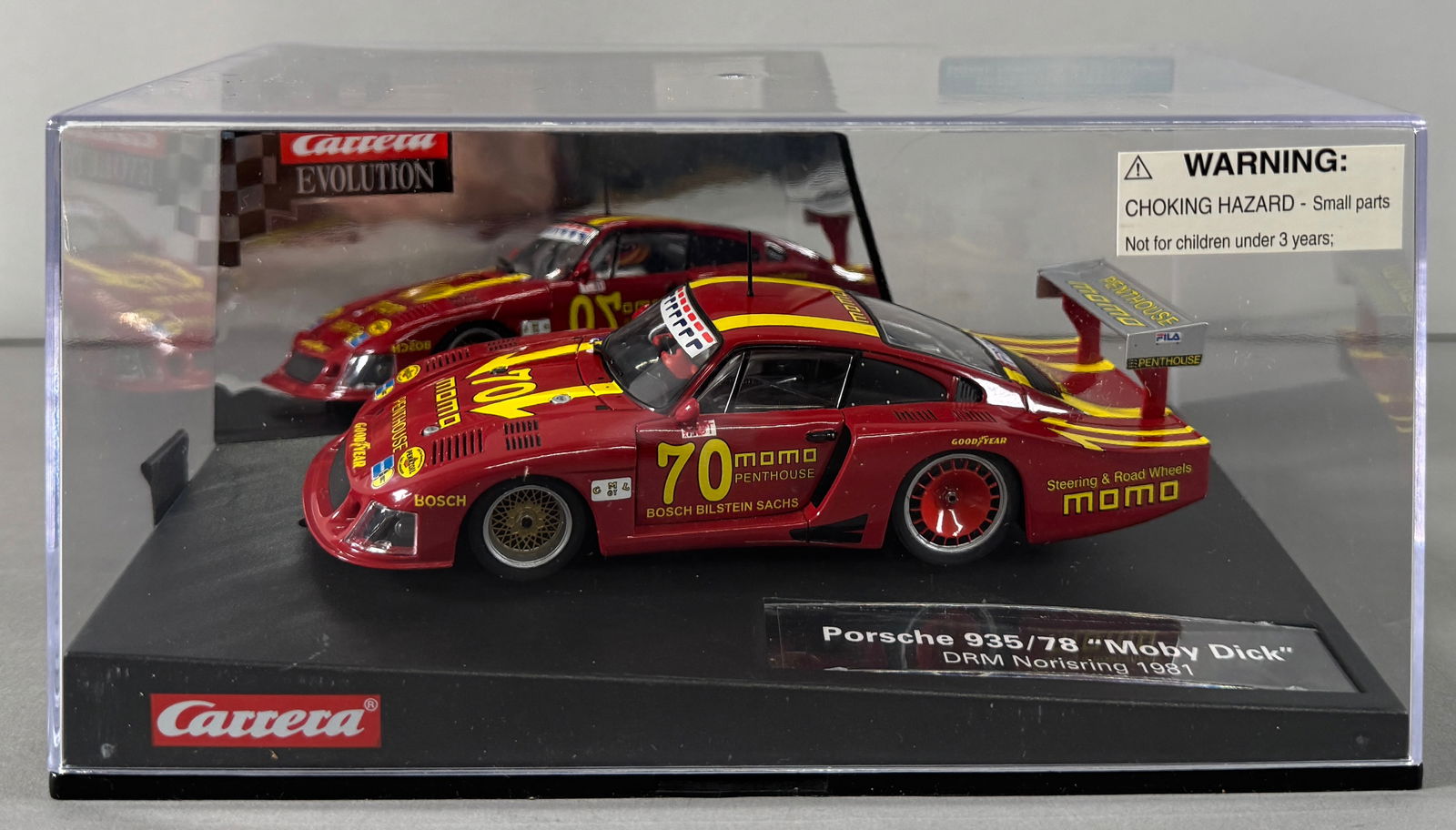 Carrera Evolution Porsche 935/78 Moby Dick DRM Norisring 1981 #70 momo 1/32 Slot Cars: Carrera Evolution Porsche 935/78 Moby Dick DRM Norisring 1981 #70 momo 1/32 Slot Cars. Reference #27180, with original case.