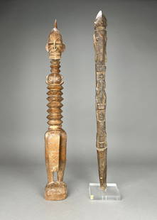 Two African Wood Items including Senufo Degele: Two carved African wood items including a Senufo Degele&nbsp;figure with stylized features including an elongated ringed neck and truncated legs and an African carved staff depicting stylized figures.