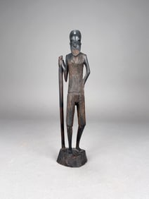 Carved African Figure Holding a Staff
