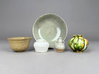Group of  Five Asian Ceramic Items: A group of five Asian ceramics including a flared rim celadon cup, celadon floral plate, Blanc de Chine jar with small ring handles, double gourd vase with handles, and a&nbsp;sancai glazed flared rim