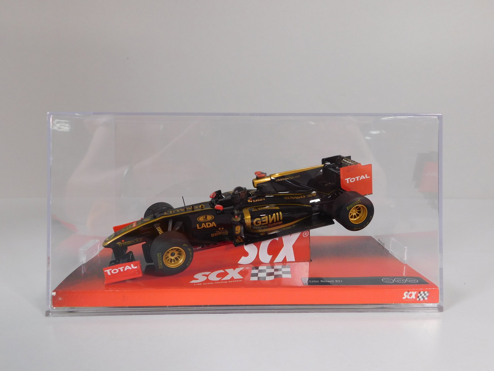 SCX Lotus Renault F1 #9 1/32 Slot Car: SCX Lotus Renault #9 F1 1/32 Slot Car. Reference #A10040X3UO, with original case. Weight: 7.2oz. *In-house Shipping Available*
