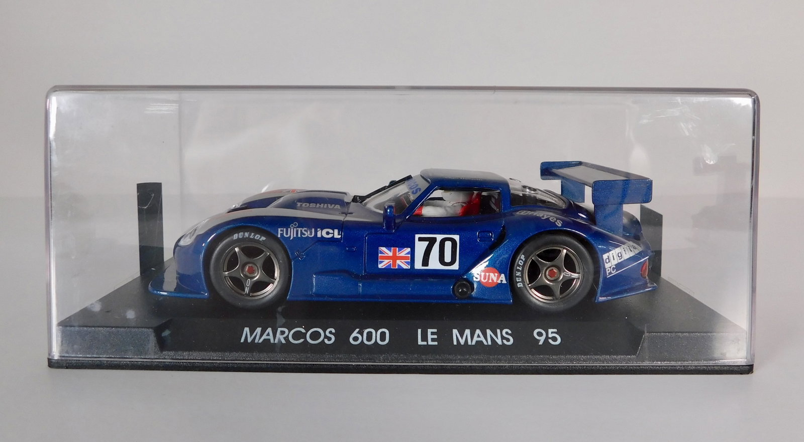 Marcos 600 Le Mans 95 #70 1/32 Slot Car: Marcos 600 Le Mans 95 #70 Team Marcos 1/32 Slot Car, with original case. Weight: 6.5 oz. *In-house Shipping Available*