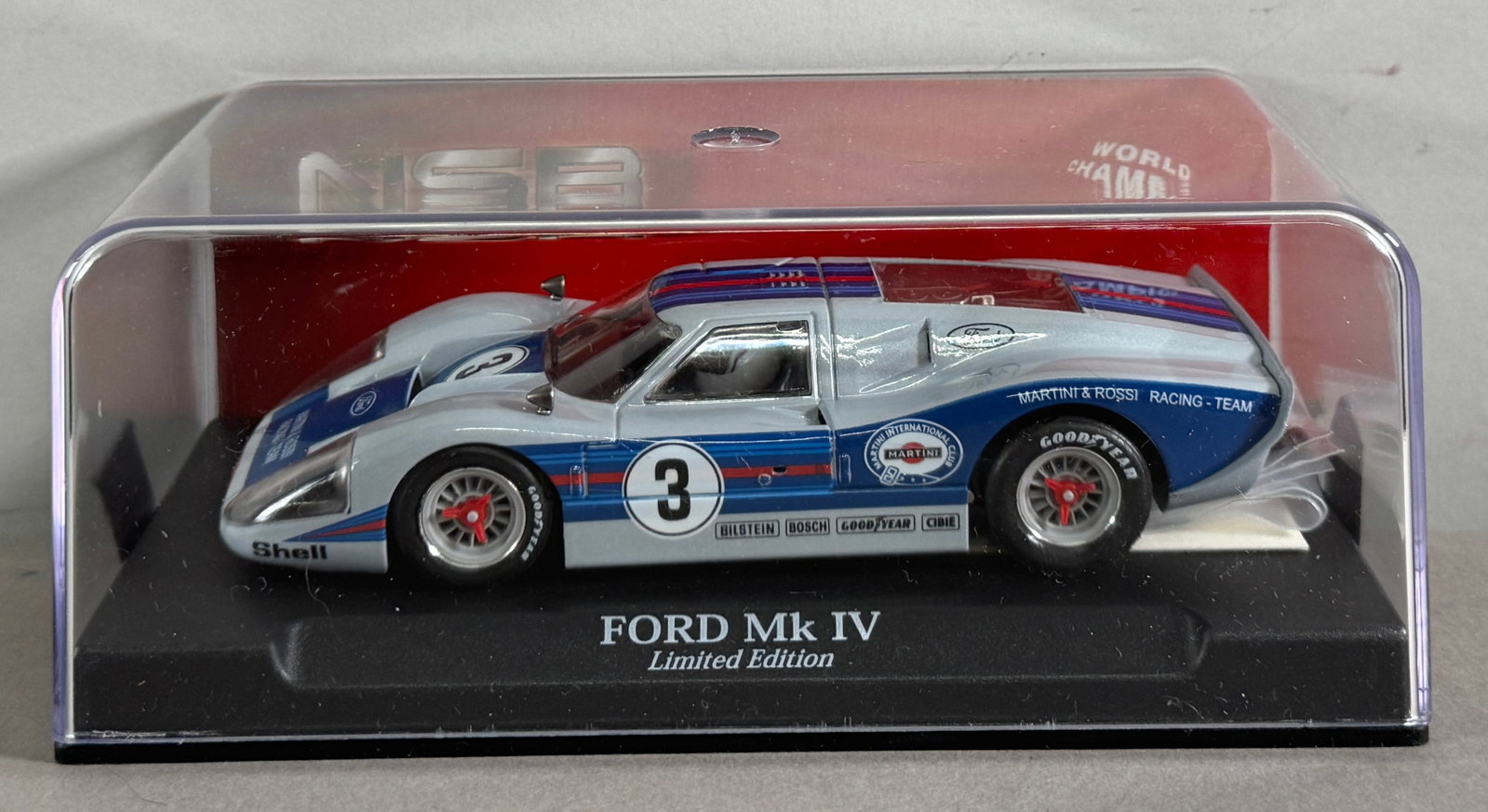 NSR Ford MK IV Limited Edition #3 1/32 Slot Car: NSR Ford MK IV Limited Edition #3 Martini & Rossi Racing Team 1/32 Slot Car. Reference #1178SW, with original case. *In-house Shipping Available*
