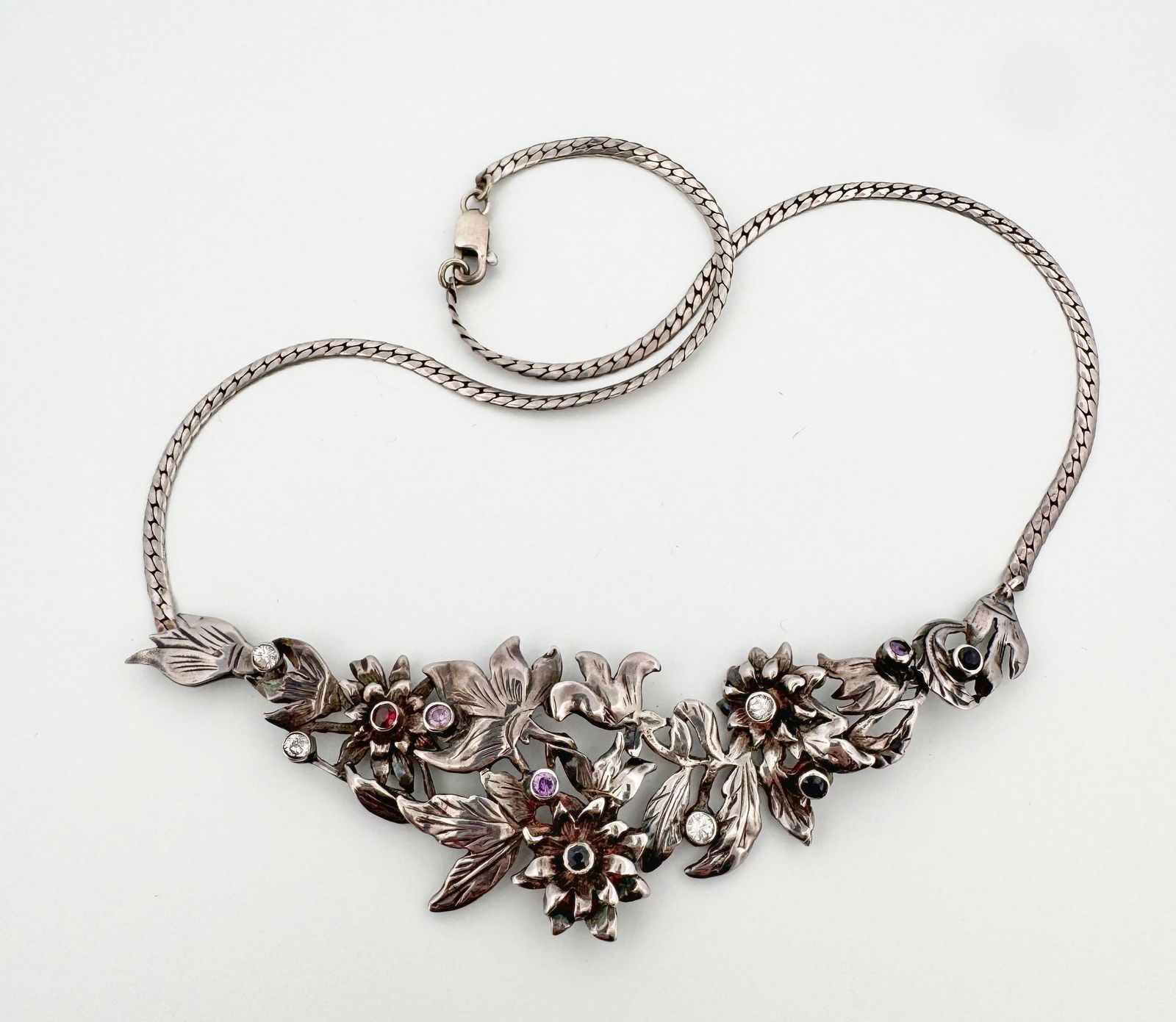 Silver Diamond & Gemstone Necklace: 950 silver and 14k gold floral necklace with bezel set diamonds and gemstones 21g 16"