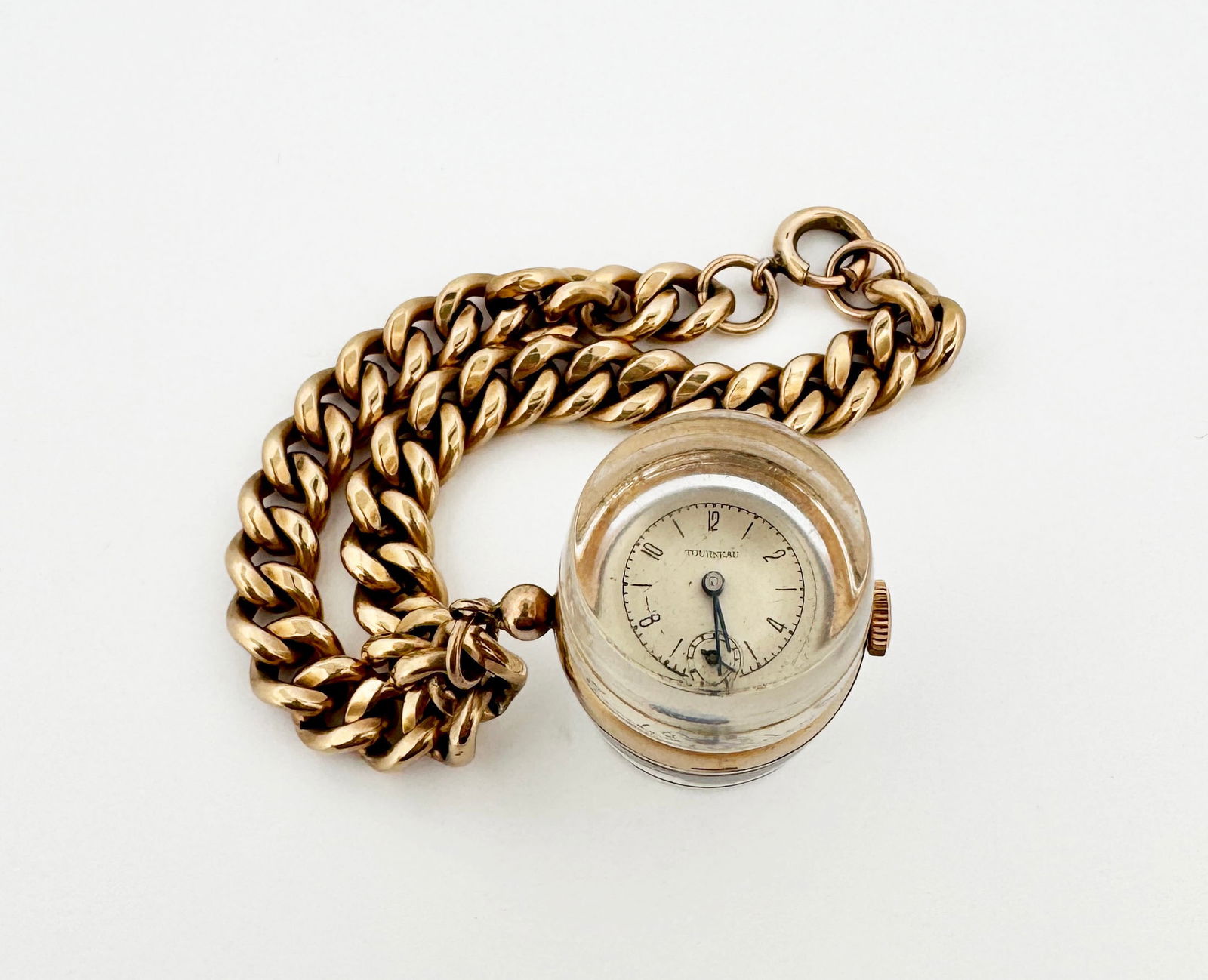 Tourneau Gold-Filled Watch Pendant Bracelet: Gold-filled bracelet with a lucite Tourneau watch pendat 36.2g 7"