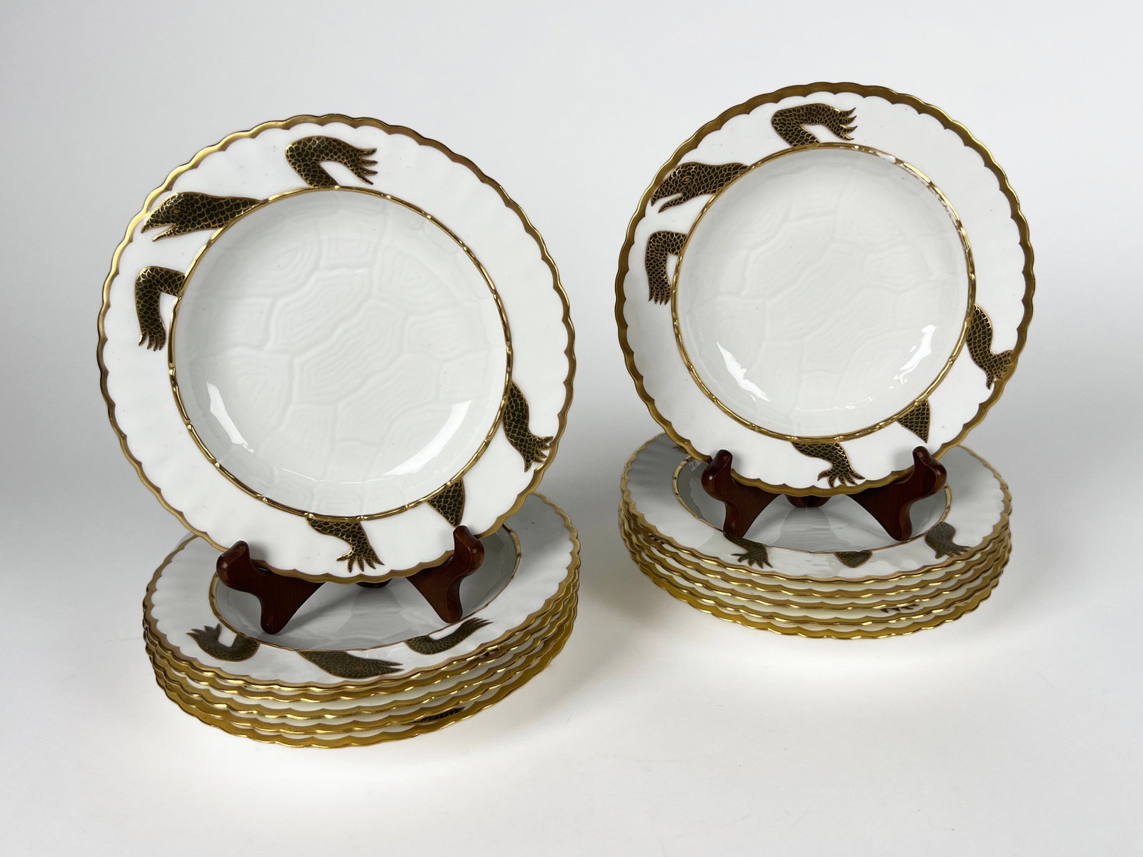 Set of 12 Moore Bros. Porcelain Turtle Soup Bowls: Set of twelve porcelain soup bowls by Moore Bros., England with turtle motif, circa 1902-05, number 2663. 8" diameter Total Weight: 122 oz
