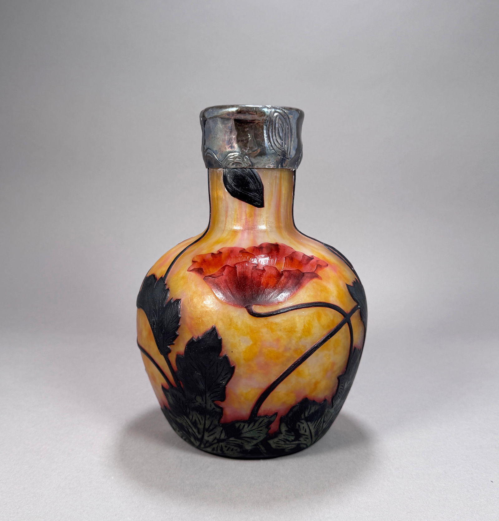 Daum Silver Rimmed Carved Cameo Glass Vase: Daum Nancy France wheel carved cameo glass vase with applied silver rim, marked near base 10.25”H 83.6oz