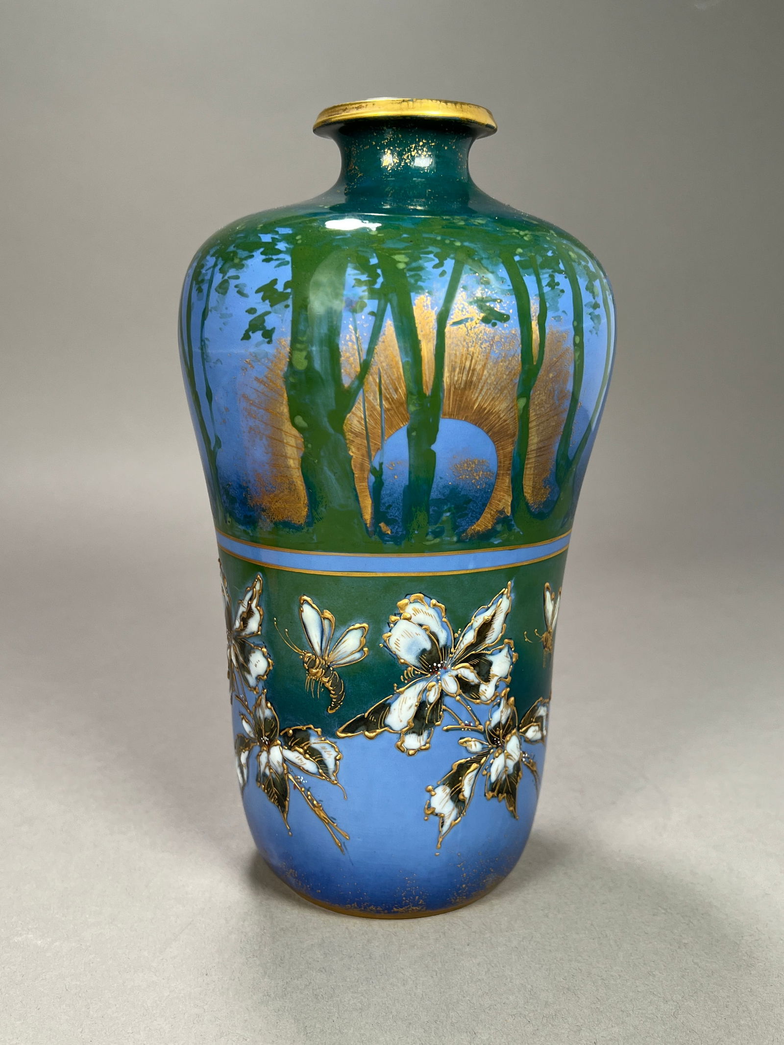 Riessner, Stellmacher & Kessel Amphora Forest Sunrise Vase: Riessner, Stellmacher & Kessel, Forest Sunrise Vase, partial gilt glazed porcelain, marked 469 Height : 9 1/4" Weight: 67 oz.