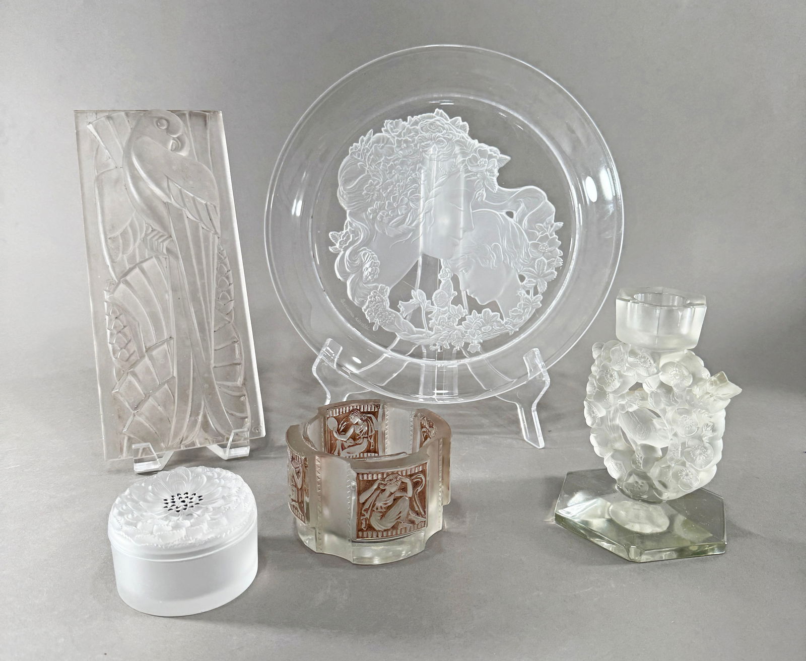 Lalique Crystal Objects: Luciana Roselli for Lalique plate "Mother and Child" Lalique candlestick, "Mesanges" Lalique powder box, "Helene" (no lid) Lalique round box, "Dahlia" Parrot pa