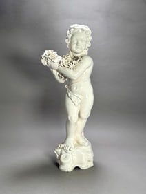 Italian Porcelain Putti Figure