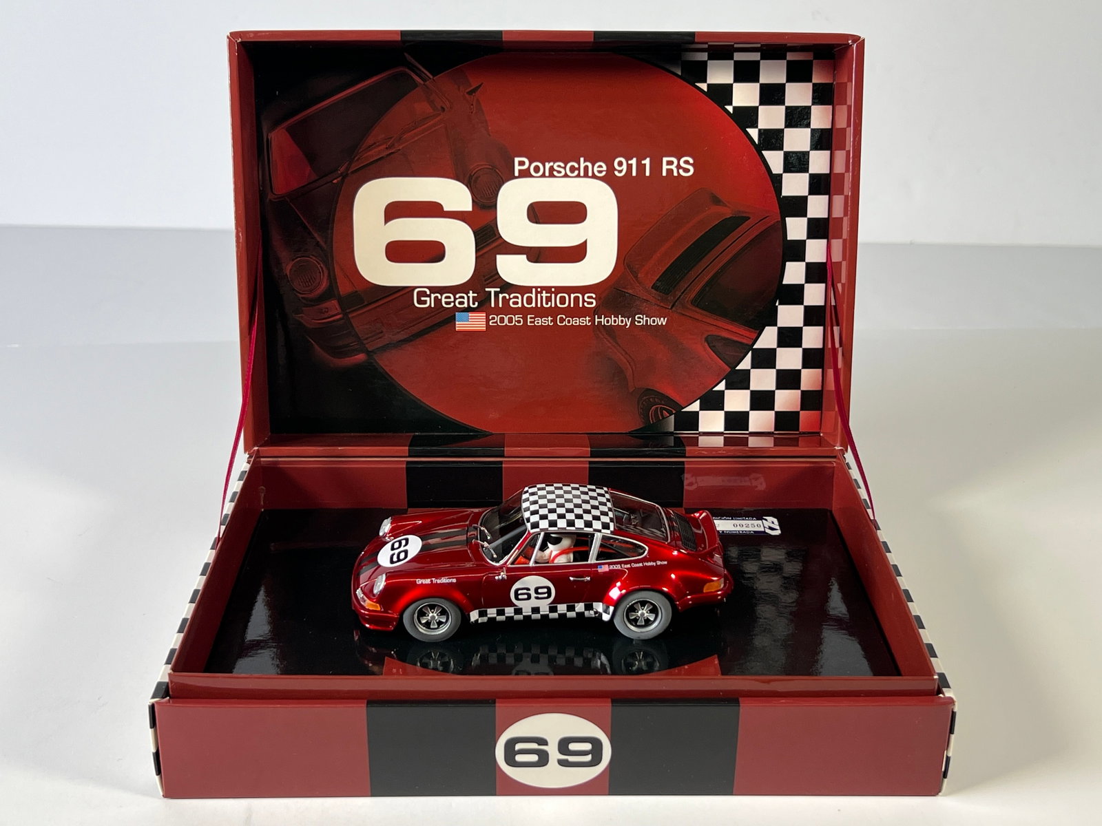 Porsche 911 RS Great Traditions 2005 East Coast Hobby Show #69 1/32 Slot Car: Porsche 911 RS Great Traditions 2005 East Coast Hobby Show #69 1/32 Slot Car, with original case. Weight: 10 oz. Limited edition #00250