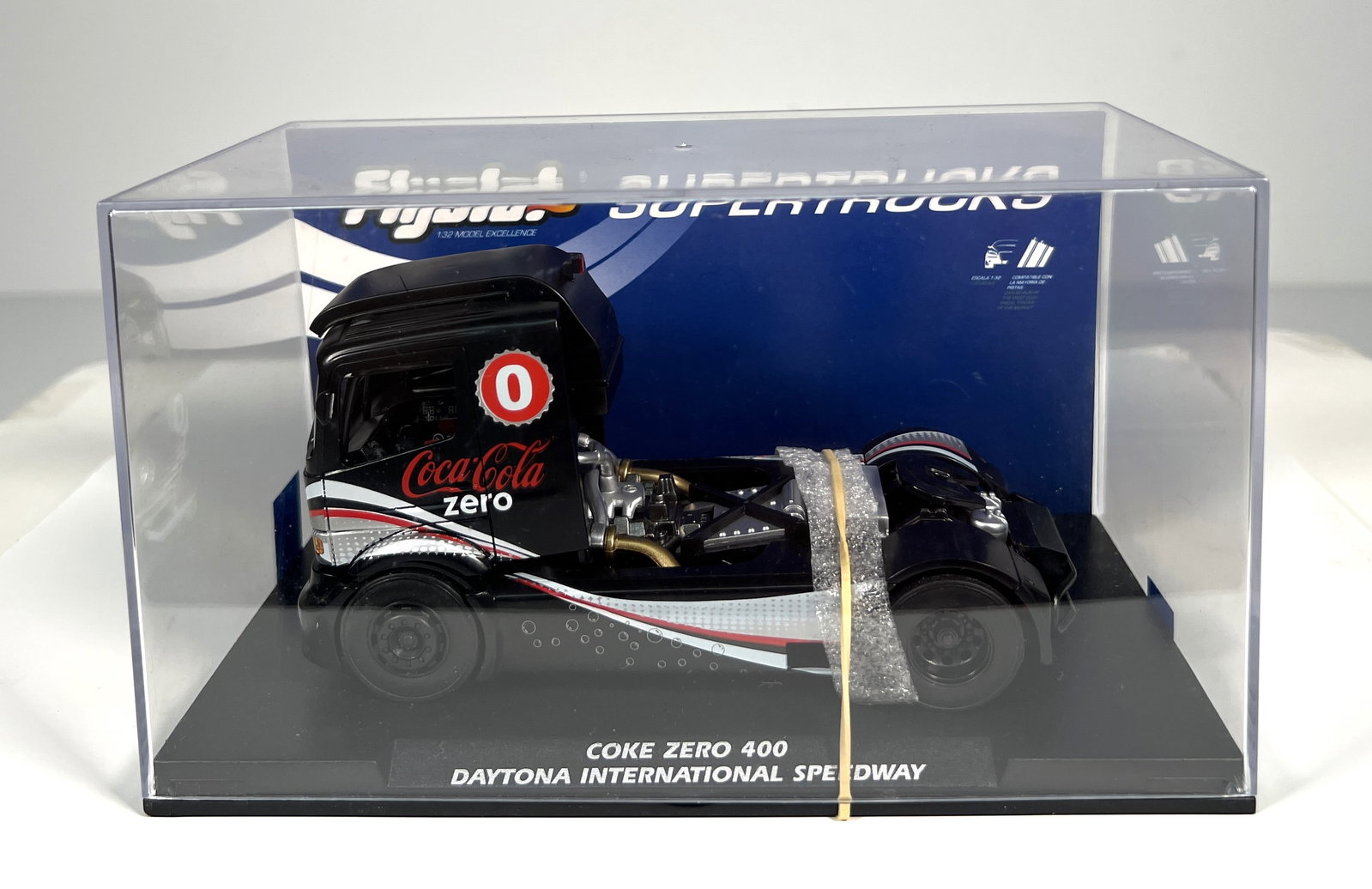Flyslot Supertrucks Mercedes Benz Coke Zero 400 Daytona International Speedway #0 1/32 Slot Car: Flyslot Supertrucks Mercedes Benz Coke Zero 400 Daytona International Speedway #0 1/32 Slot Car. Reference #202301, with original case. Weight: 12 oz.