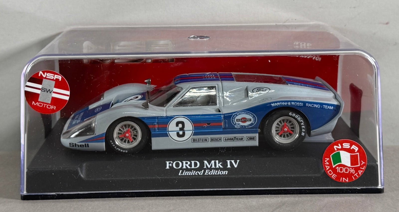 NSR Ford Mk IV Limited Edition #3 1/32 Slot Car: NSR Ford Mk IV Limited Edition #3 Martini & Rossi Racing Team 1/32 Slot Car. Reference #1178SW, with original case. SW Motor.