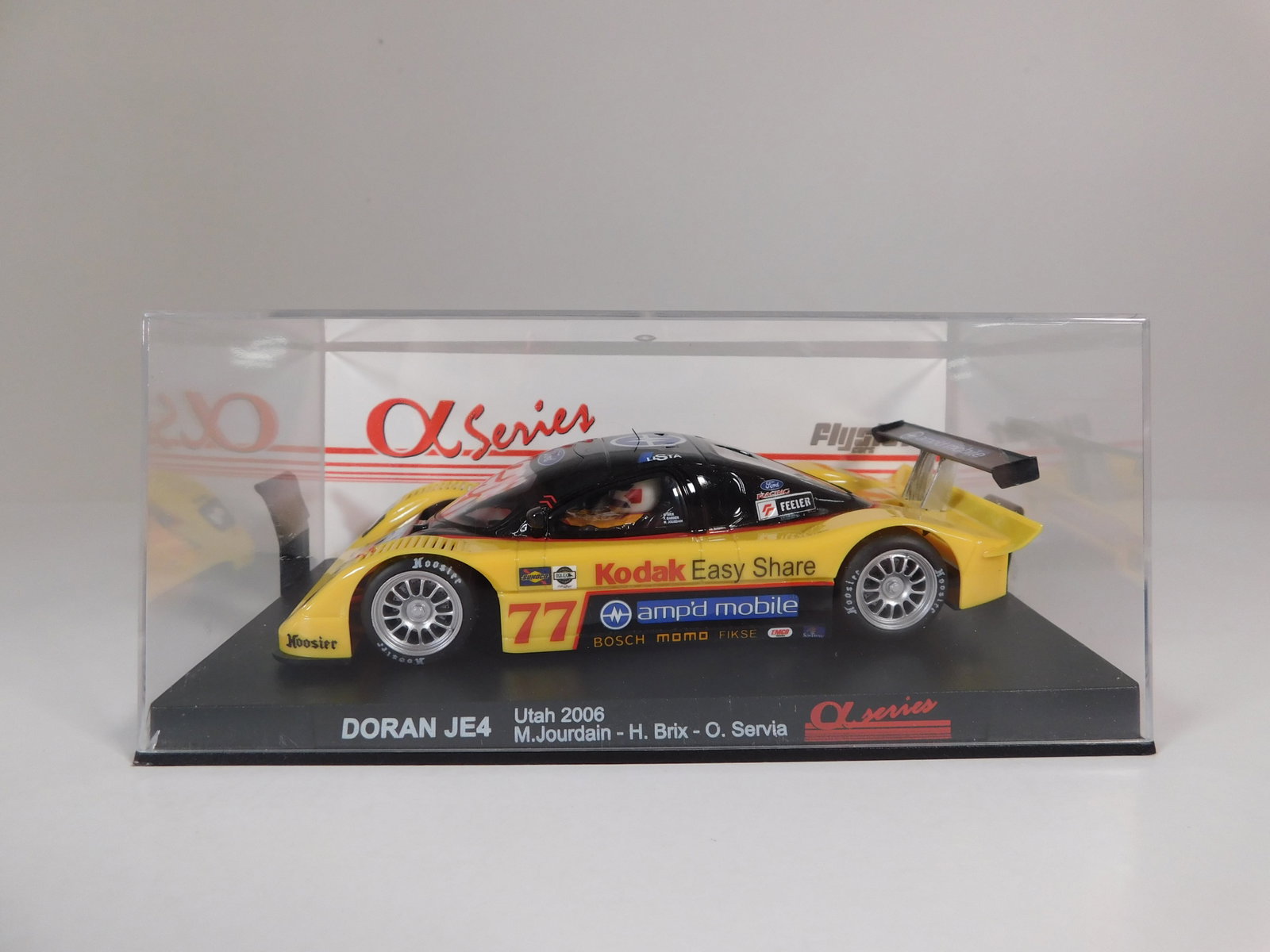 Flyslot Ford Doran JE4 Utah 2006 #77 1/32 Slot Car: Flyslot Ford Doran JE4 Utah 2006 Jourdain - Brix - Servia #77 Kodak 1/32 Slot Car. Reference #M03101, with original case. Weight: 7.1 oz.