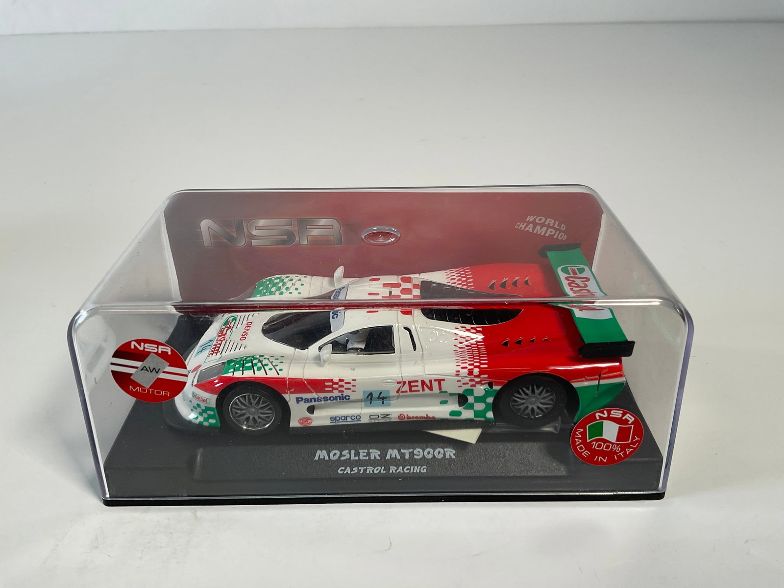 NSR Mosler MT900R #14 1/32 Slot Car: NSR Mosler EVO 3 MT900R Team Castrol Racing #14 Zent 1/32 Slot Car, with original case. Weight: 7.3 oz. AW Motor.