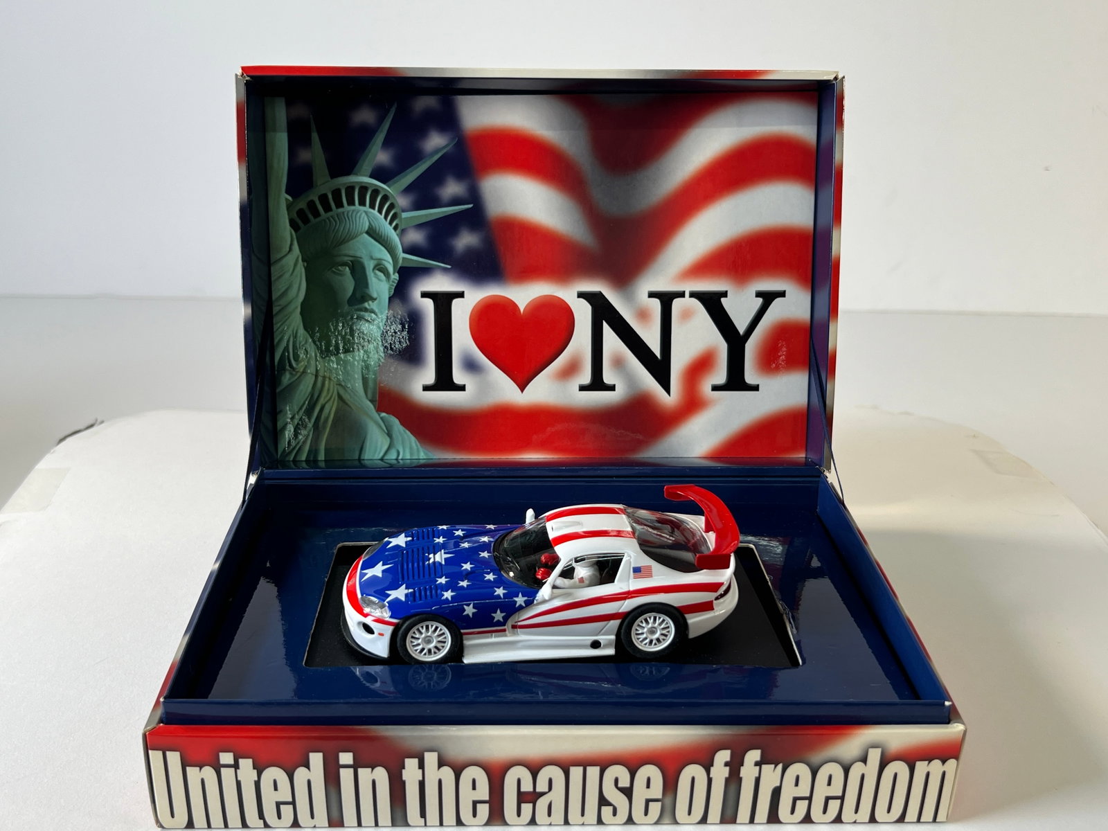 Fly Car Model Dodge Viper GTS R 'I Love NY' 1/32 Slot Car: Dodge Viper GTS R I Love NY - United in the Cause of Freedom 1/32 Slot Car, with original case. Box measures approximately 3 x 9.75 inches and weighs 10 oz. 