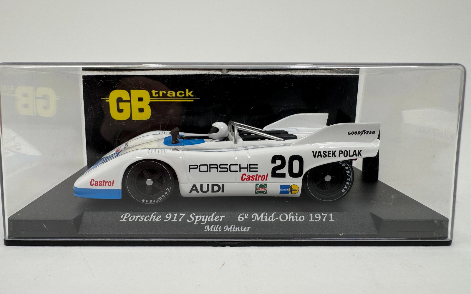 GB Track Porsche 917 Spyder 6th Mid-Ohio 1971 1/32 Slot Car: GB Racing Track Porsche 917 Spyder 6th Mid-Ohio 1971. White with blue trim and sponsor decals. Displayed in original packaging.