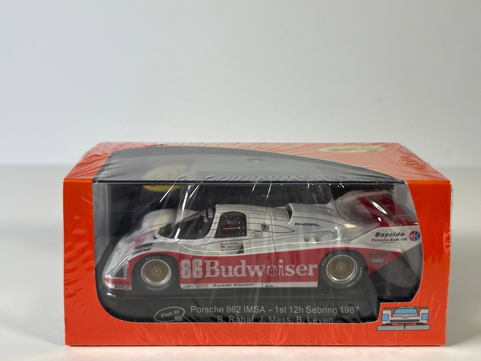 Slot.it Porsche 962 IMSA 1st 12h Sebring 1987 #86 1/32 Slot Car: Slot.it Porsche 962 IMSA 1st 12h Sebring 1987 Rahal - Mass - Leven #86 Budweiser 1/32 Slot Car. Reference #CA25c, with original case. Case length: 6.5 inches. Weight: 7oz. New in shrink-wrapped box.
