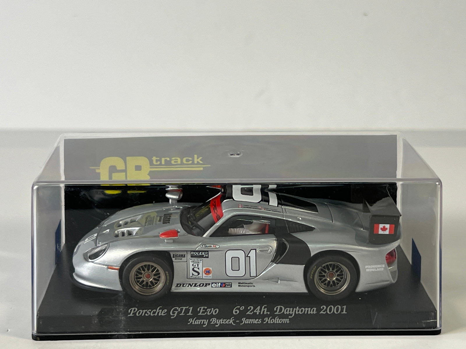 GB Track Porsche GT1 Evo 6th 24h Daytona 2001 #1 1/32 Slot Car: GB Track Porsche GT1 Evo 6th 24h Daytona 2001 Bytzek - Holtom #1 1/32 Slot Car. Reference #GB73, with original case. Weight: 6 oz.