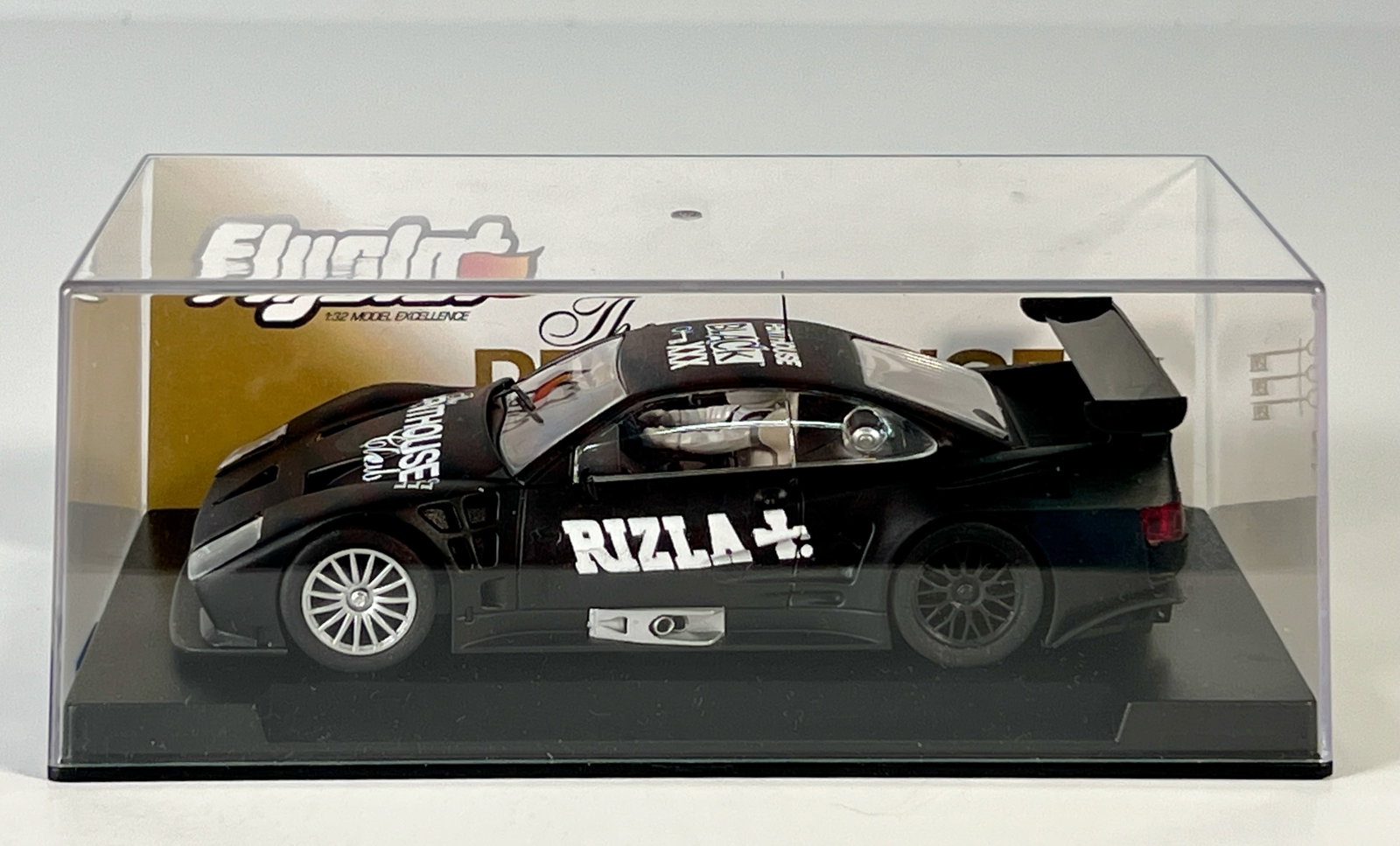 Flyslot Lister Storm Penthouse Edition 1/32 Slot Car: Flyslot Lister Storm Penthouse Edition Rizla 1/32 Slot Car. Reference #018301, with original case. Weight: 6.6 oz.