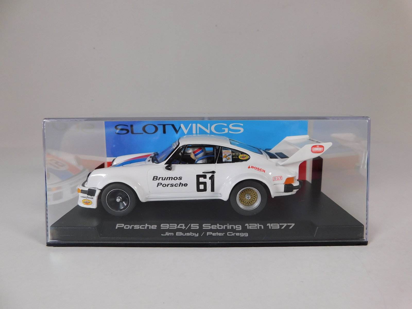 Slotwings Porsche 934/5 Sebring 12h 1977 #61 1/32 Slot Car: Slotwings Porsche 934/5 Sebring 12h 1977 Busby - Gregg #61 Brumos 1/32 Slot Car. Reference #W065-01, with original case. Weight: 6.5 oz.