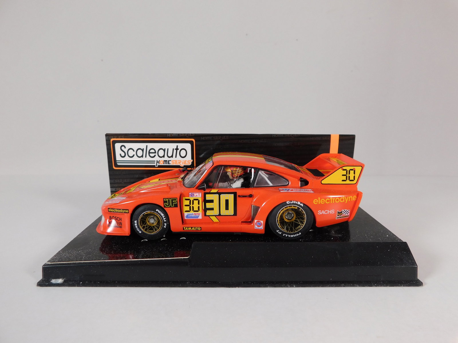 Scaleauto Porsche 935/77 24h Daytona 1980 #30 1/32 Slot Car: Scaleauto Porsche 935/77 24h Daytona 1980 Electrodyne #30 momo 1/32 Slot Car. Reference #SC-9101, with original case. Weight: 5.8 oz. 