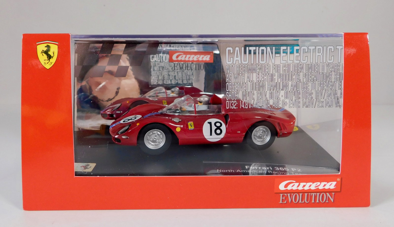 Carrera Evolution Ferrari 365 P2 North American Racing Team #18 1/32 Slot Car: Carrera Evolution Ferrari 365 P2 North American Racing Team #18 1/32 Slot Car. Reference #20027536, with original case. Weight: 17 oz.