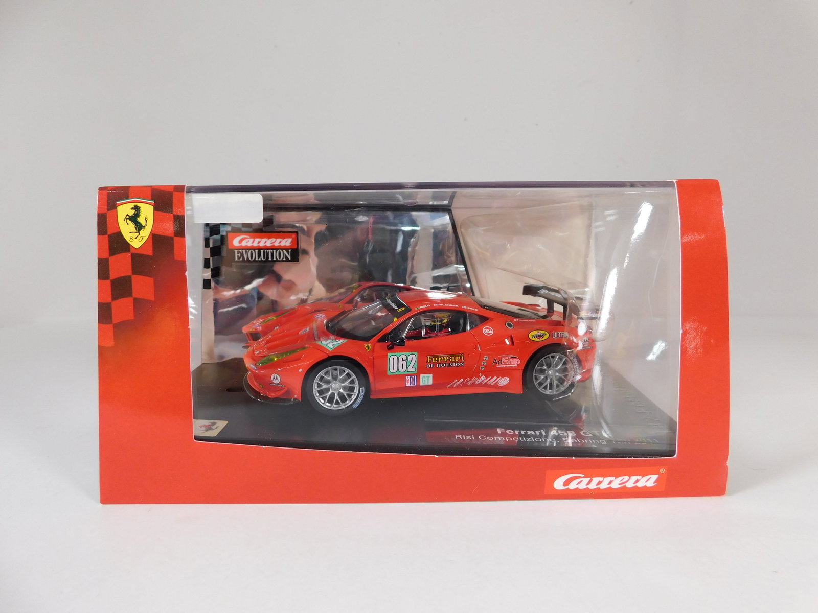 Carrera Evolution Ferrari 458 GT2 Risi Competizione Sebring 12h 2011 #062 1/32 Slot Car: Carrera Evolution Ferrari 458 GT2 Risi Competizione Sebring 12h 2011 #062 1/32 Slot Car. Reference #24383, with original case. Weight: 17 oz.