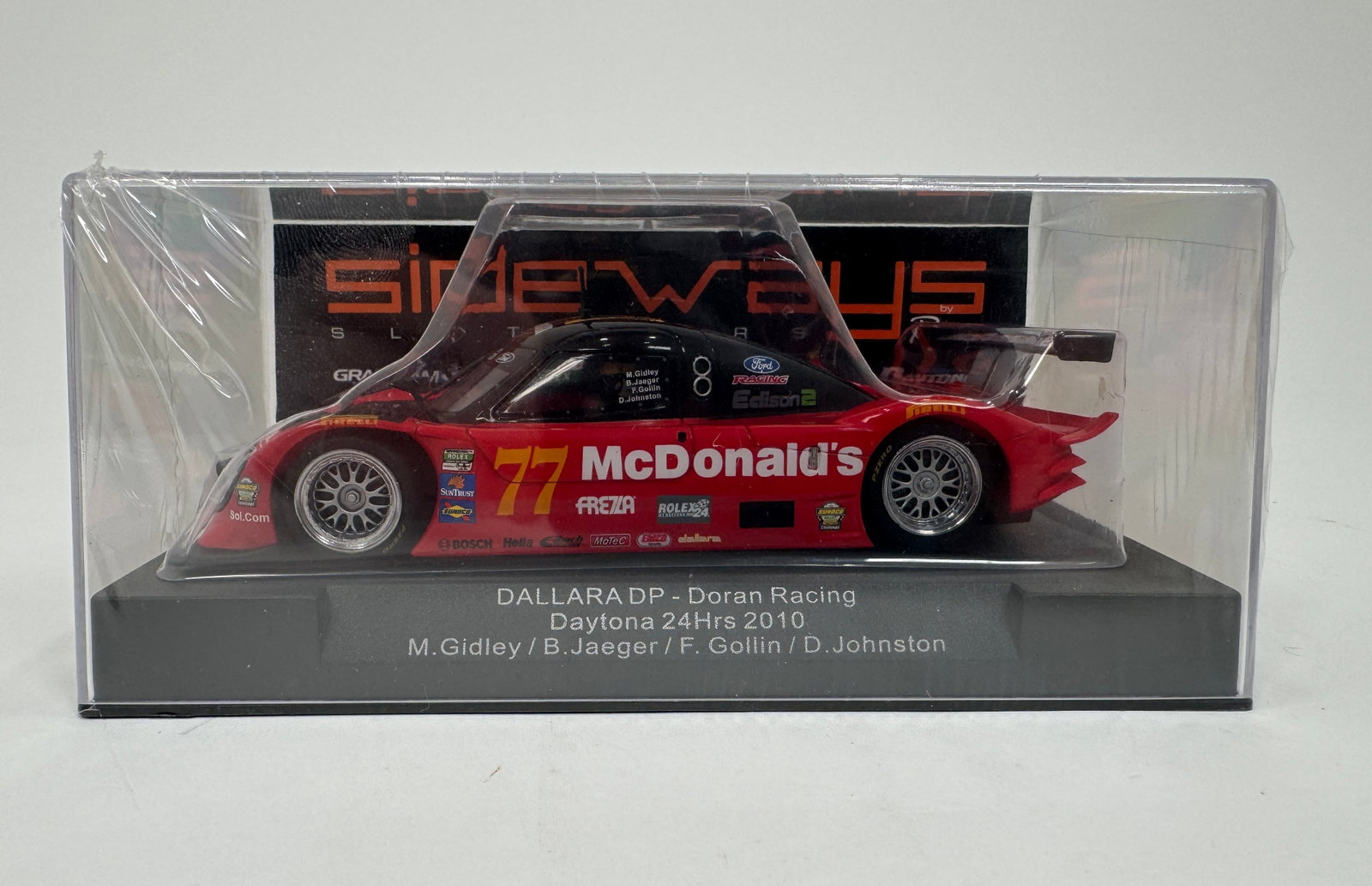 Sideways Dallara DP Doran Racing Daytona 24hrs 2010 1/32 Slot Car: Sideways Dallara DP Doran Racing Daytona 24hrs 2010 model car. Features the #77 McDonald's livery. Displayed in original packaging.