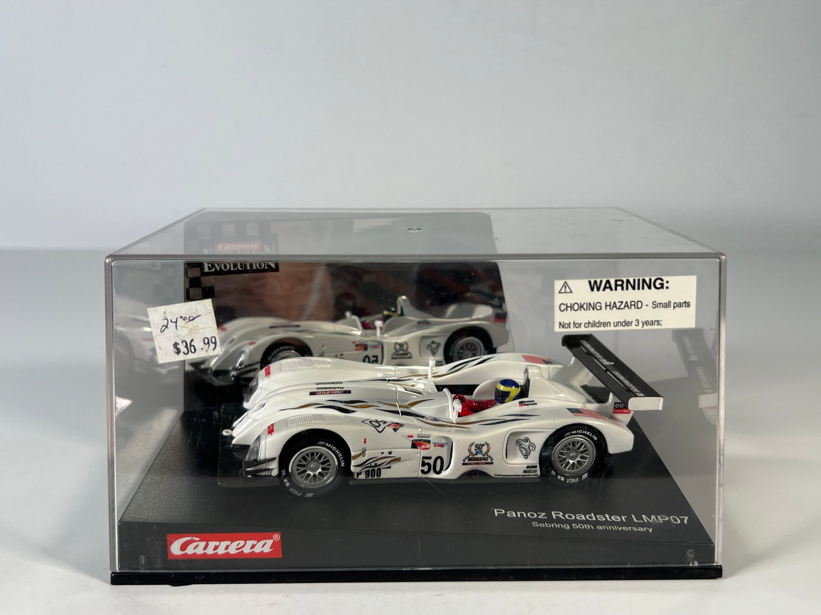 Carrera Evolution Panoz Roadster LMP07 Sebring 50th Anniversary #50 1/32 Slot Car: Carrera Evolution Panoz Roadster LMP07 Sebring 50th Anniversary #50 1/32 Slot Car, with original case. Weight: 12.3 oz.
