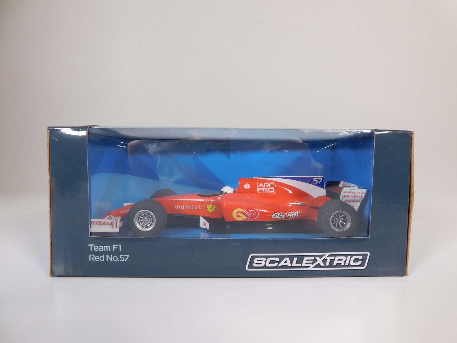 Scalextric Team F1 Red #57 1/32 Slot Car: Scalextric Team F1 Red #57 arc pro 1/32 Slot Car, with original case. Weight: 5oz.