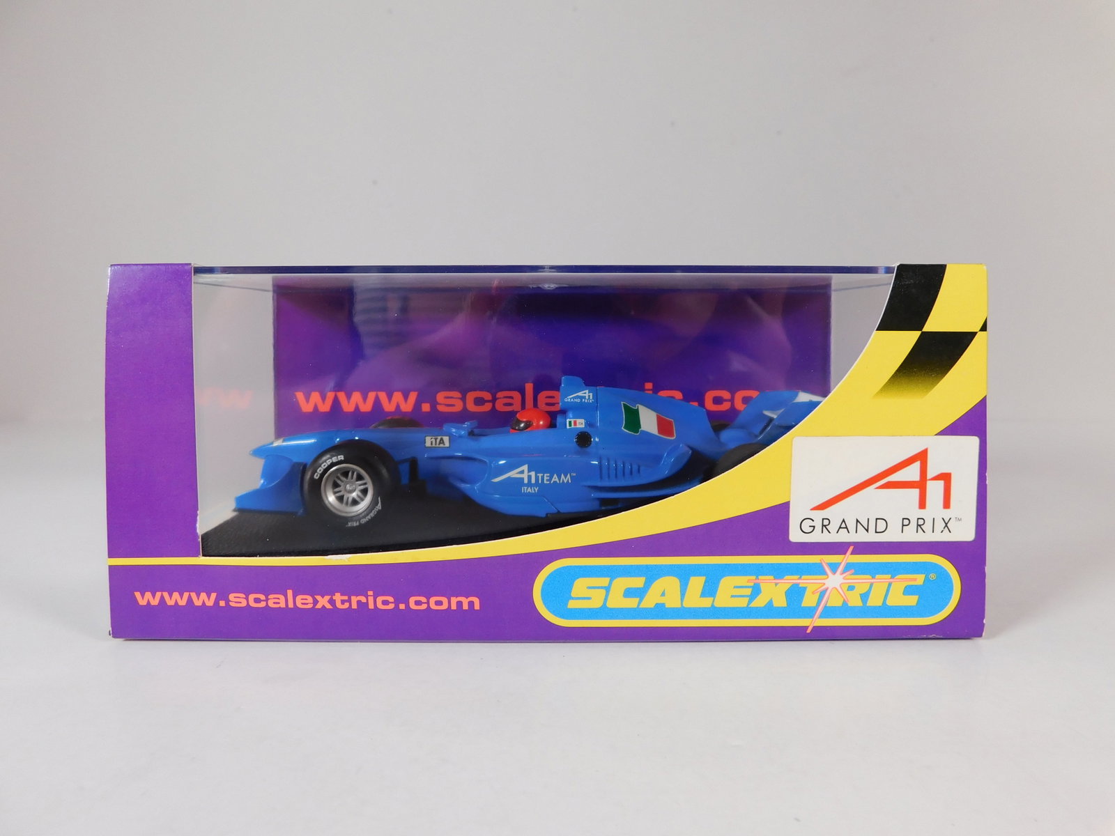 Scalextric A1 Grand Prix Team Italy 1/32 Slot Car: Scalextric A1 Grand Prix Team Italy 1/32 Slot Car. Reference #C2745, with original case. Weight: 7.2 oz.