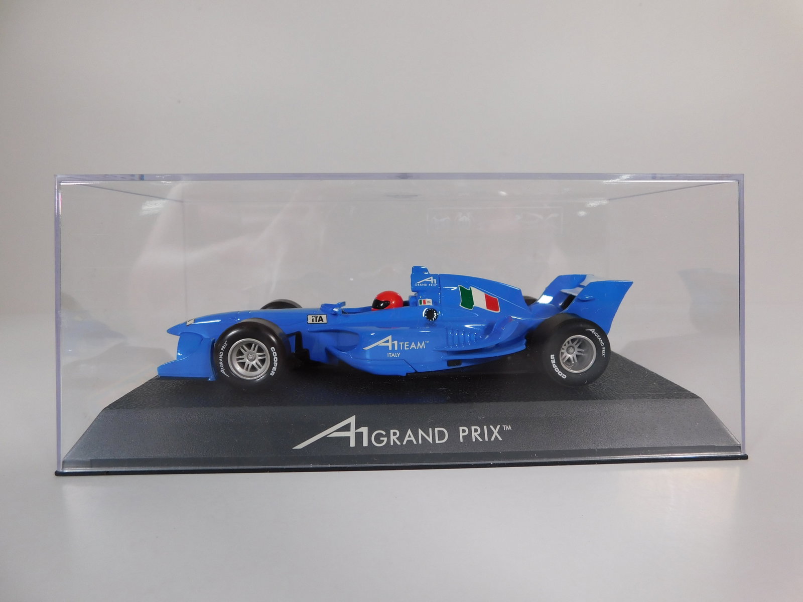 Scalextric A1 Grand Prix Team Italy 1/32 Slot Car: Scalextric A1 Grand Prix Team Italy 1/32 Slot Car. Reference #C2745, with original case. Weight: 7.3 oz.
