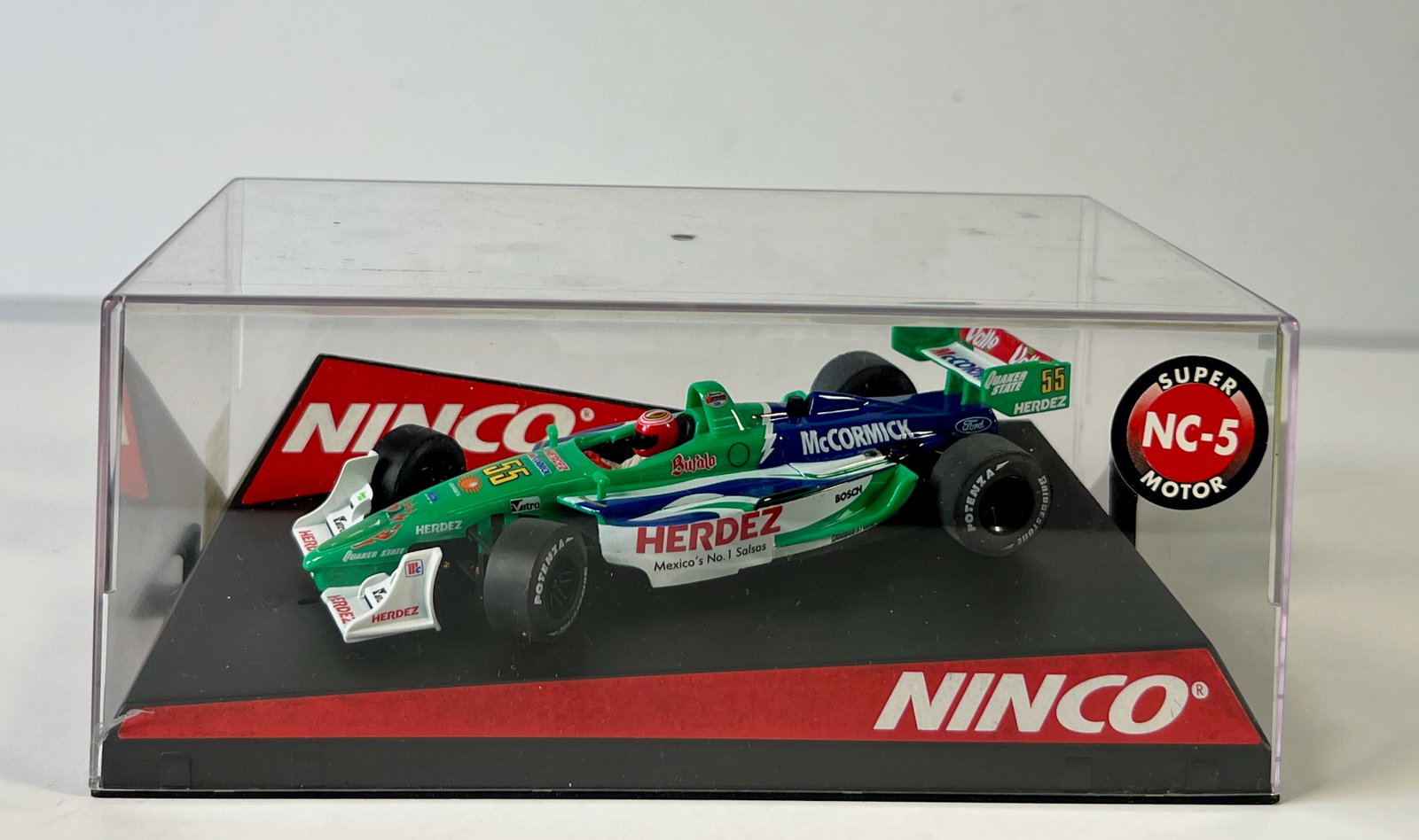 Ninco Lola Ford Herdez Competition #55 1/32 Slot Car: Ninco Lola Ford Herdez Competition #55 McCormick 1/32 Slot Car. Reference #50319, with original case. Weight: 9 oz. NC-5 motor.