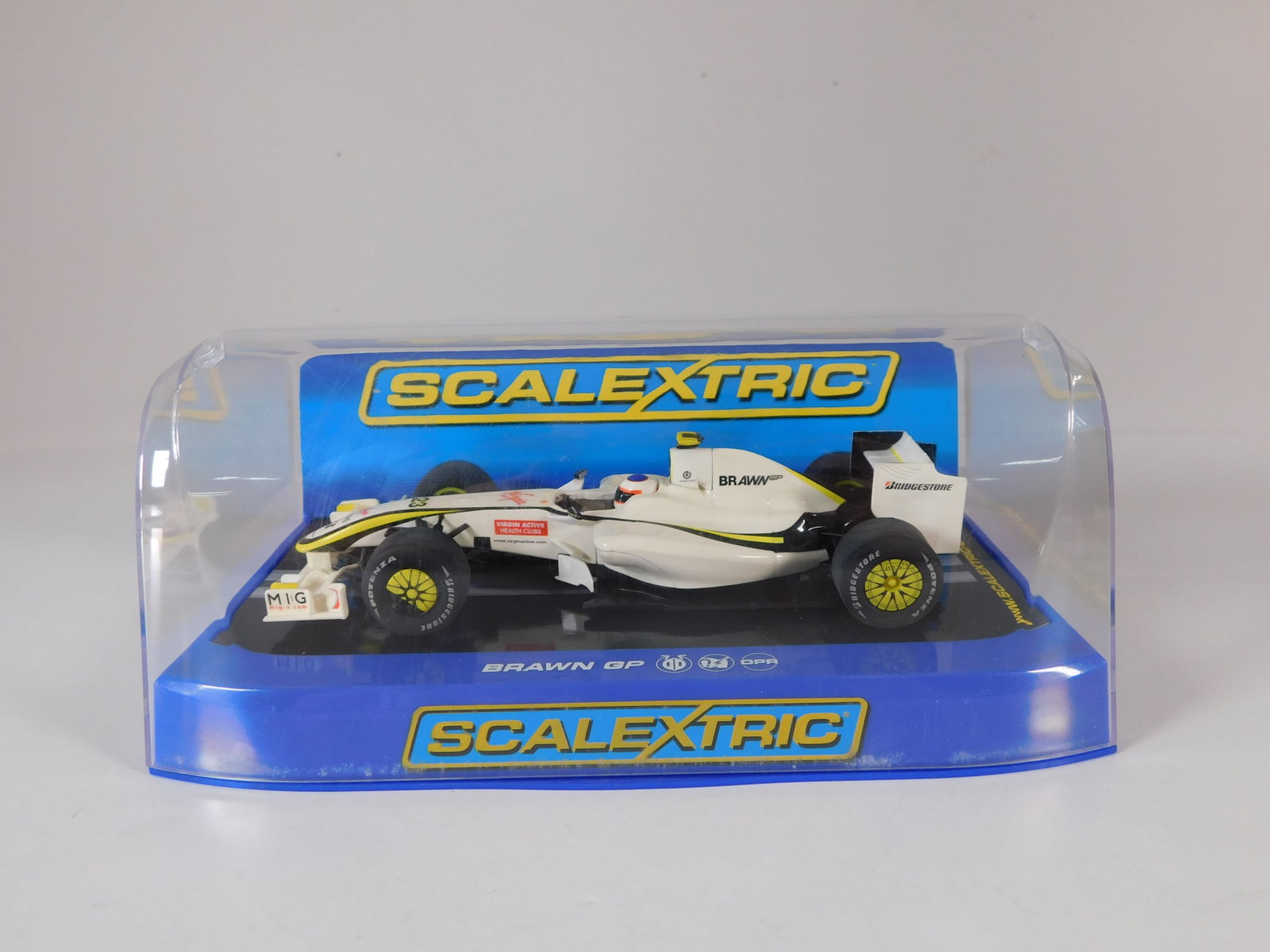 Scalextric Brawn GP #23 1/32 Slot Car: Scalextric Brawn GP 001 Rubens Barrichello #23 1/32 Slot Car. Reference #C3048, with original case. Weight: 7.7 oz.