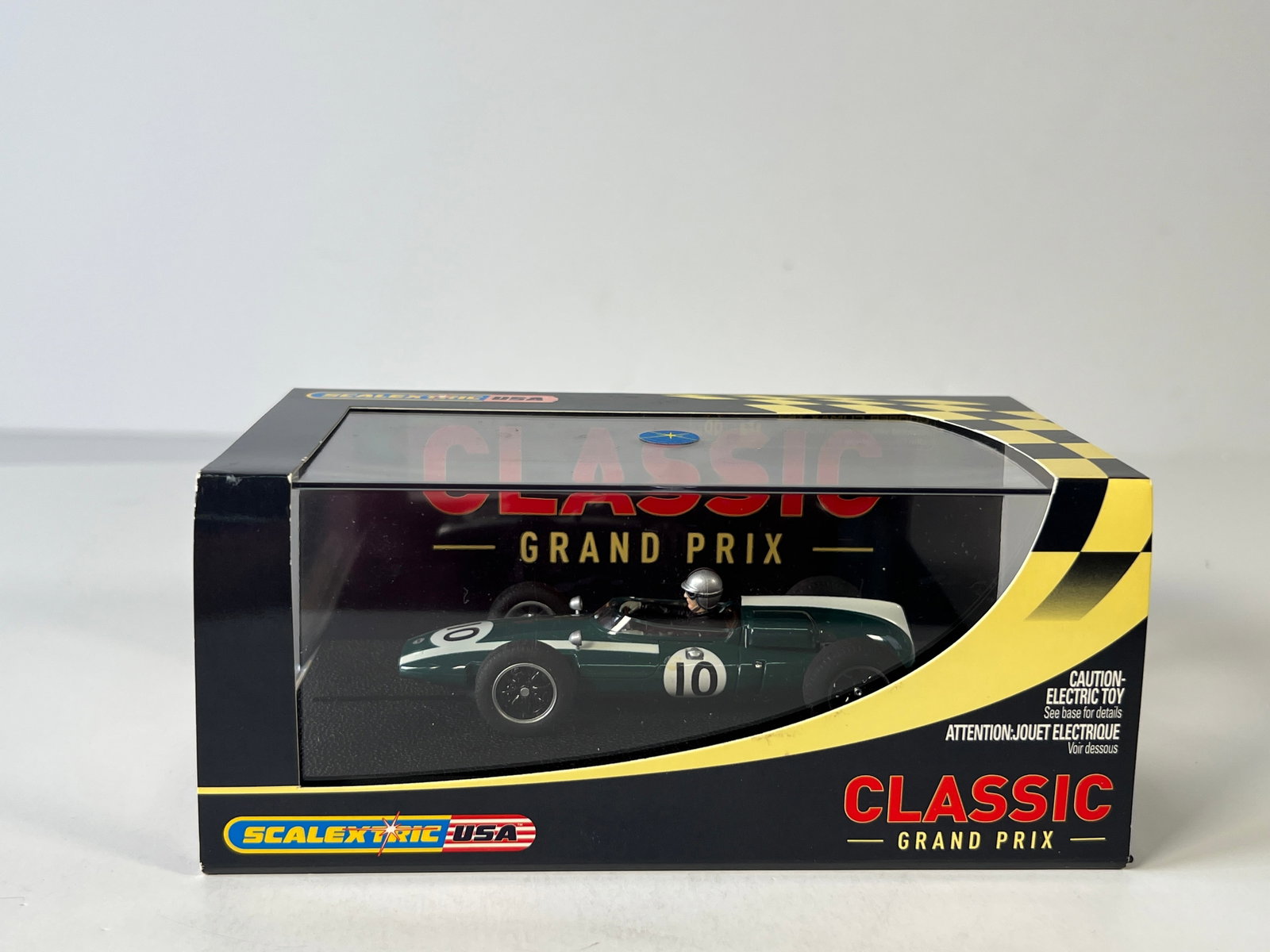 Scalextric USA Classic Grand Prix Cooper Climax T53 #10 1/32 Slot Car: Scalextric USA Grand Prix Classic Cooper Climax T53 #10 1/32 Slot Car, with original case. Weight: 7 oz.