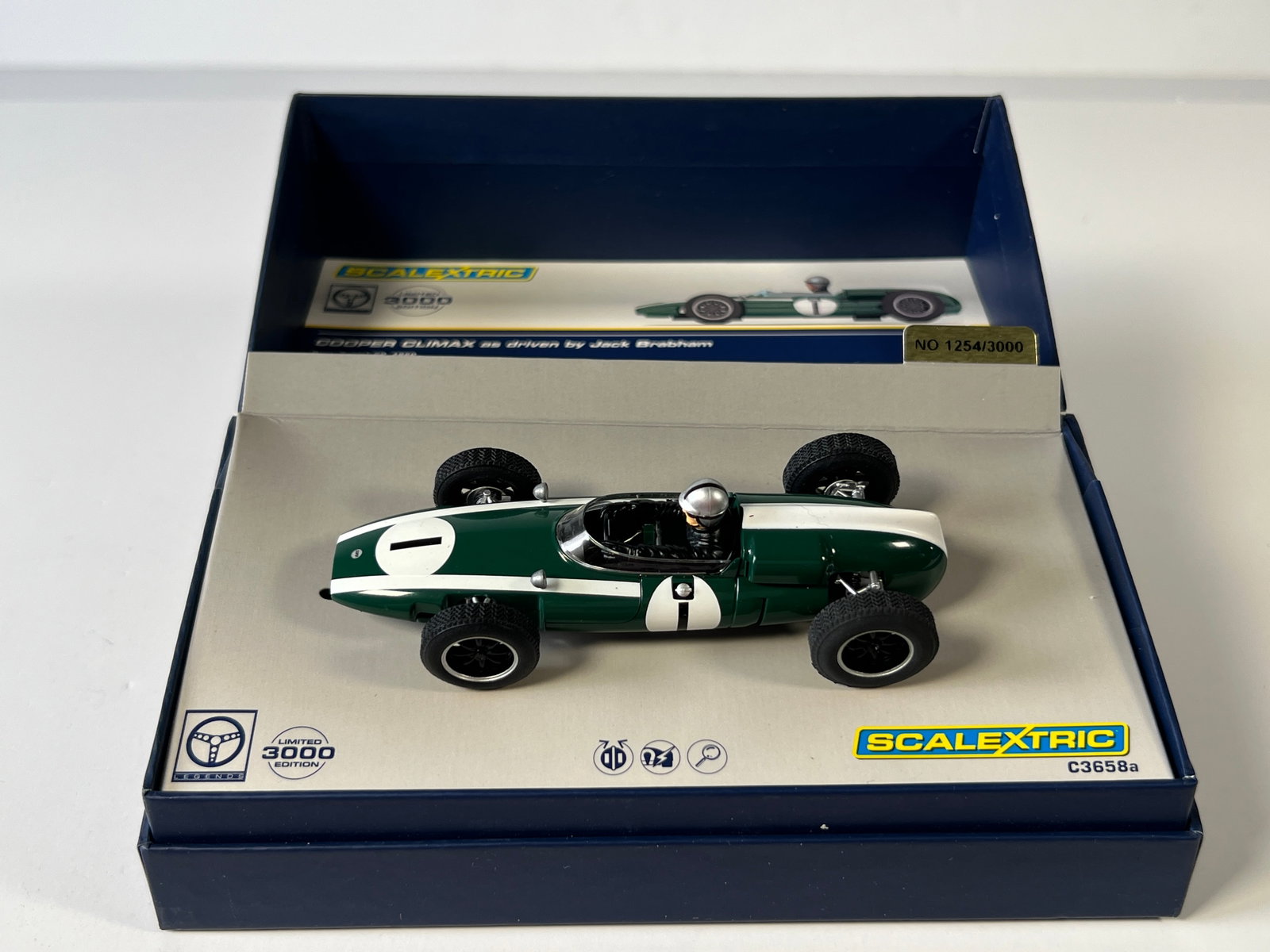 Scalextric Legends Cooper Climax #1 1/32 Slot Car: Scalextric Legends Cooper Climax - Jack Brabham #1 1/32 Slot Car. Reference #C3658a, with original case. Weight: 6 oz. LImited edition 1254/3000