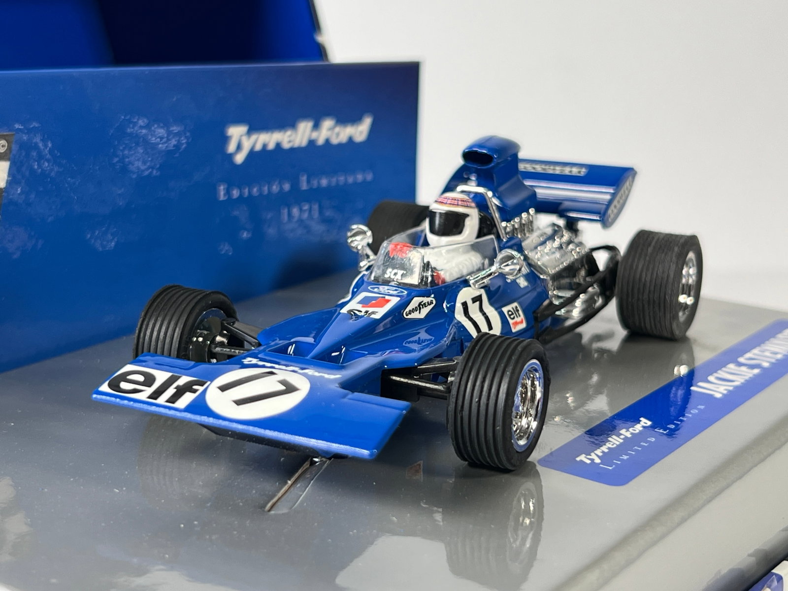 SCX Vintage Tyrrell-Ford Jackie Stewart Limited Edition #17 Elf 1/32 Slot Car: SCX Vintage Tyrrell-Ford Jackie Stewart Limited Edition #17 Elf 1/32 Slot Car, with original case. Weight: 12 oz. Case length: 7.5''.