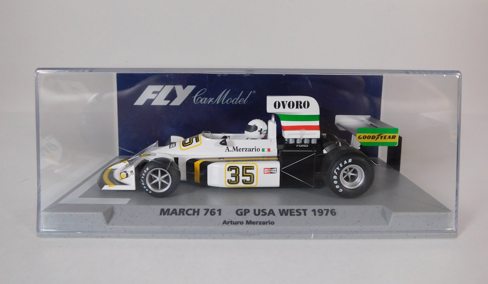 Fly Car Model March 761 GP USA West 1976 #35 1/32 Slot Car: Fly Car Model March 761 GP USA West 1976 Arturo Merzario #35 Ovoro 1/32 Slot Car. Reference #88279, with original case. Weight: 5.9 oz.