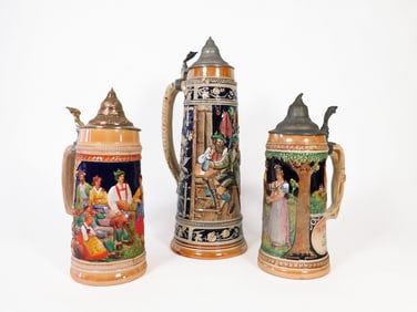 Three German Beer Steins with Pewter Lids