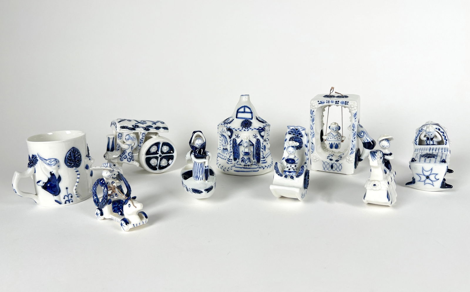 Collection of Nine Wilfred Gibson Studios Figurines: Collection of nine Wilfred Gibson miniature figurines. Largest 5”