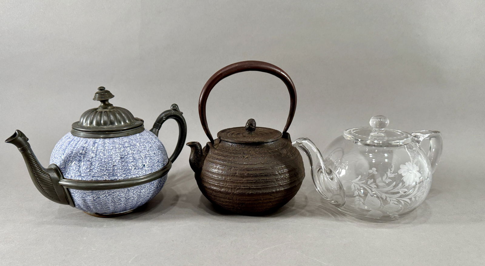 Three Decorative Teapots: Ceramic, Cast Iron, and Glass (1 of 19)
