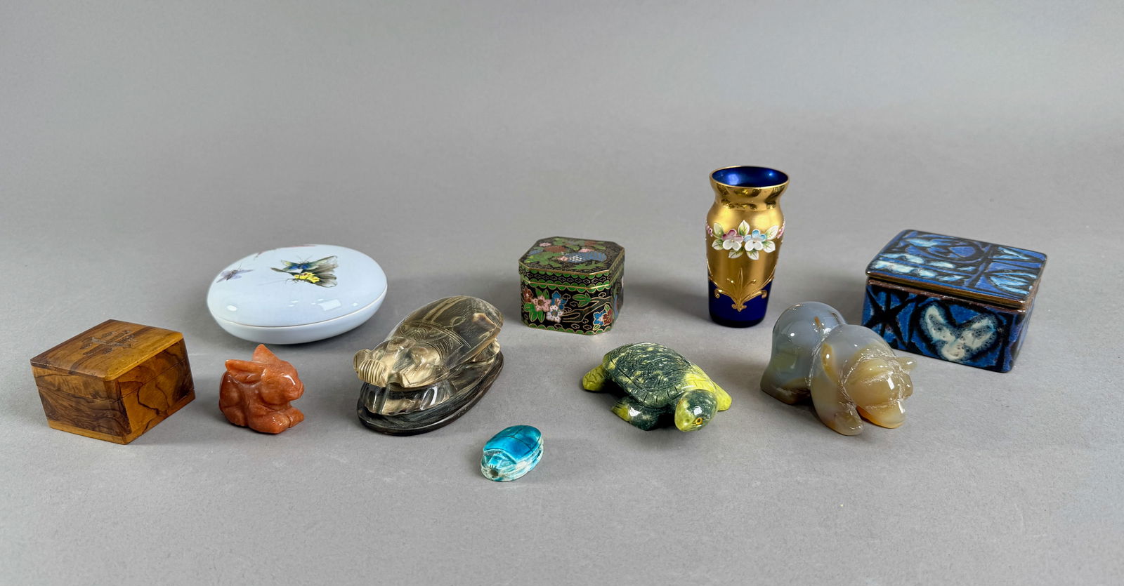 Collection of Decorative Boxes and Carved Stone Animals: A collection of decorative items including several small boxes with varying designs and carved stone animals including a turtle, bear, and rabbit. Tallest item measures 3.5 inches. Total weight is 48